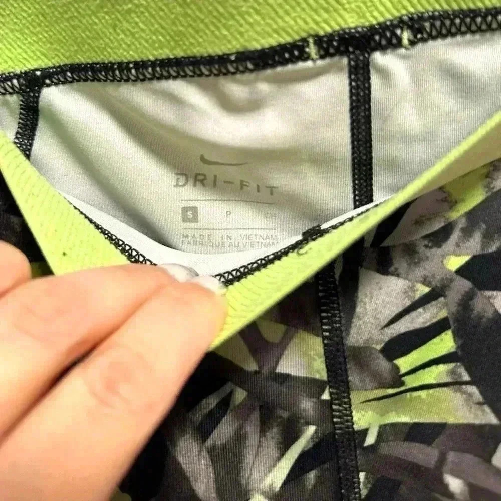 NIKE GRAY AND GREEN SPANDEX SHORTS - Picture 3 of 3
